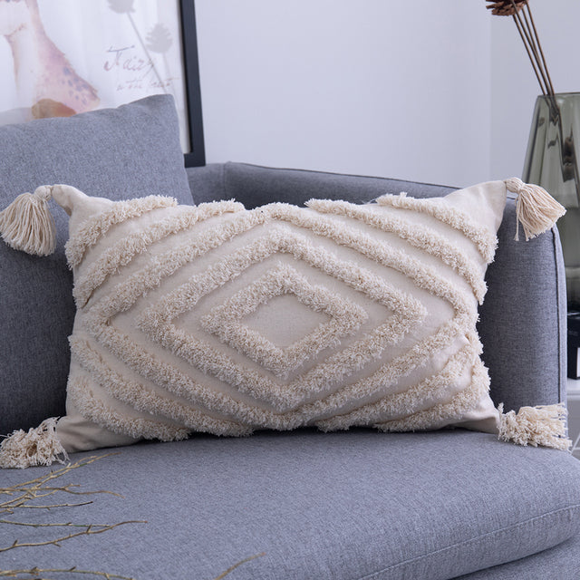 Boho tufted pillow covers 12×20 on the sofa