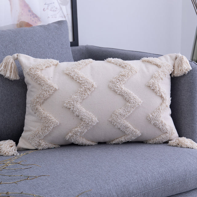 Boho tufted pillow covers 12×20 on the sofa