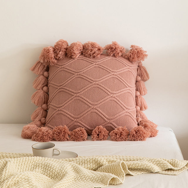 Boho pink knit pillow cover with tassels